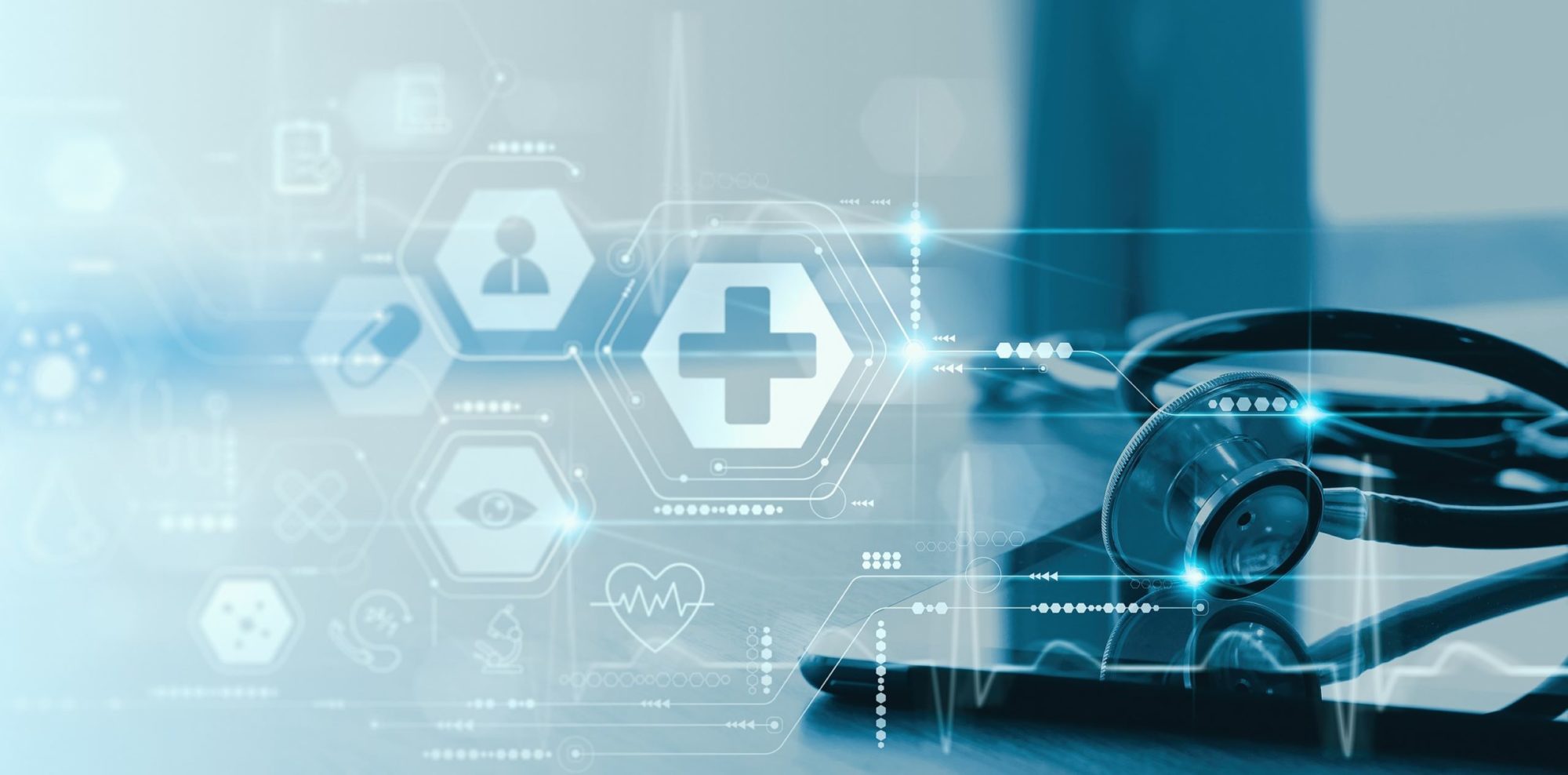 Close up of a stethoscope and digital tablet with virtual electronic medical record of patient on interface